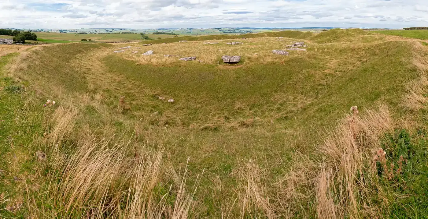 Arbor Low henge with fallen slabs on a limestone plateau