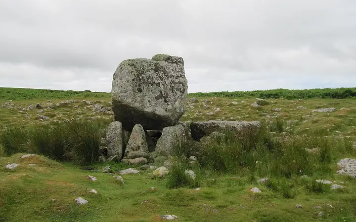 Arthur's Stone, a great split capstone on smaller stones on Cefn Bryn