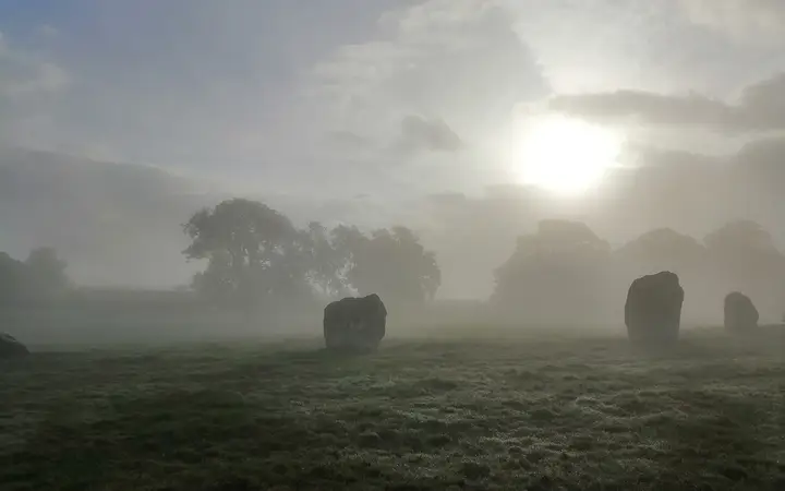 Long Meg and Her Daughters stone circle in mist