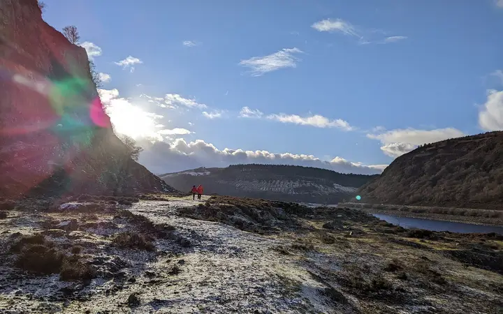 Snow-dusted hills above a reservoir in the Elan Valley, Powys