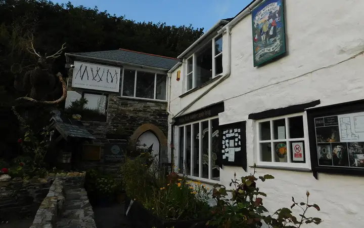 The white-painted Museum of Witchcraft and Magic beside the harbour at Boscastle