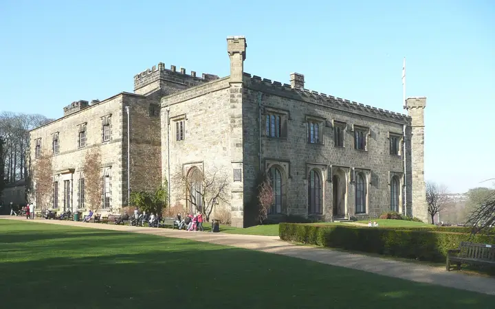Towneley Hall, a castellated stone house in parkland